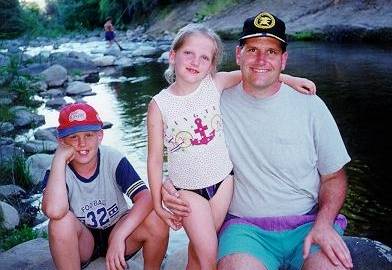 David, Grace and Dad in front of a river in Salto Del Leon