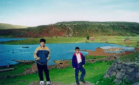 Joshua and Daniel in front of Incan tombs (Feb. 2000)