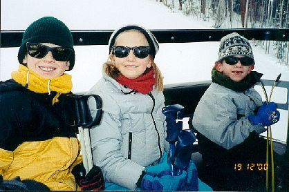 Daniel, Grace, and Mateo on the gondola in Vail, Colorado (November 18, 2000)