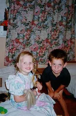 Rachel and Matthew playing barbies (March 2000)